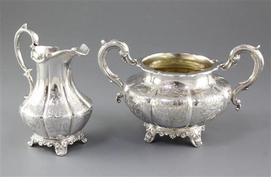 An early Victorian silver sugar basin and tall cream jug, by William Hunter, jug height 161mm, weight 22.3oz/695grms.